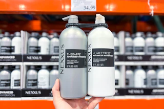 hand holding nexxus hair care at costco