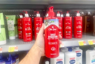 old spice hand and body lotion held in front of more lotions