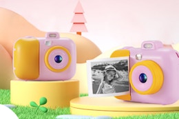 pink and yellow instant camera