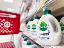 target cart parked in front of seventh generation laundry detergent sitting on a target shelf