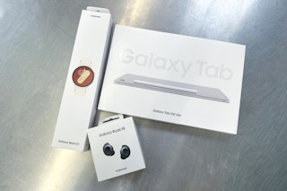 samsung tablet watch earbuds on walmart counter