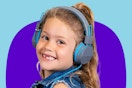 Stock image of a child wearing a blue pair of Jlab wired headphones