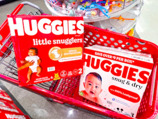 two boxes of huggies diapers in a shopping cart at Target