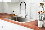 Lifestyle image of the Glacier Bay Kitchen Faucet in kitchen setting