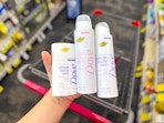 hand holding Dove whole body deodorants