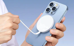 a wireless charger on the back of a phone