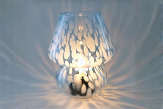 Lifestyle image of the Urban Shop Glass Mushroom Table Lamp