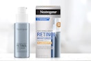 a pump bottle of moisturizer next to its packaging 