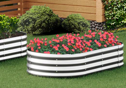 plants in a raised garden bed in a yard