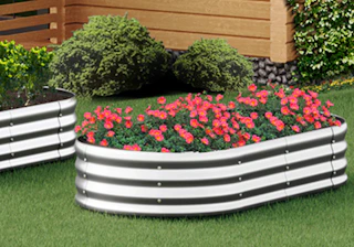 plants in a raised garden bed in a yard