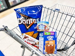 doritos, almonds, pop tarts, and candy bar in a cart