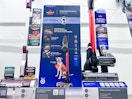 bissell furguard pet cordless stick vacuum sitting on a target shelf