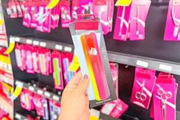 person holding a pack of nail files