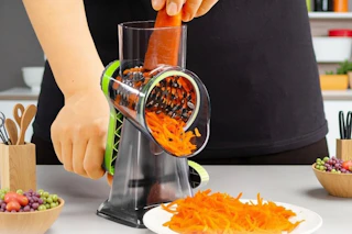 a carrot being grated