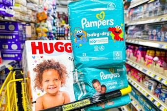pampers and luvs products stacked in dollar general shopping cart