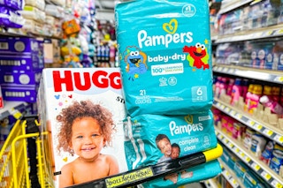 pampers and luvs products stacked in dollar general shopping cart