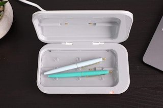 Pens in a disinfecting light box