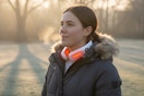 a woman wearing a neck warmer