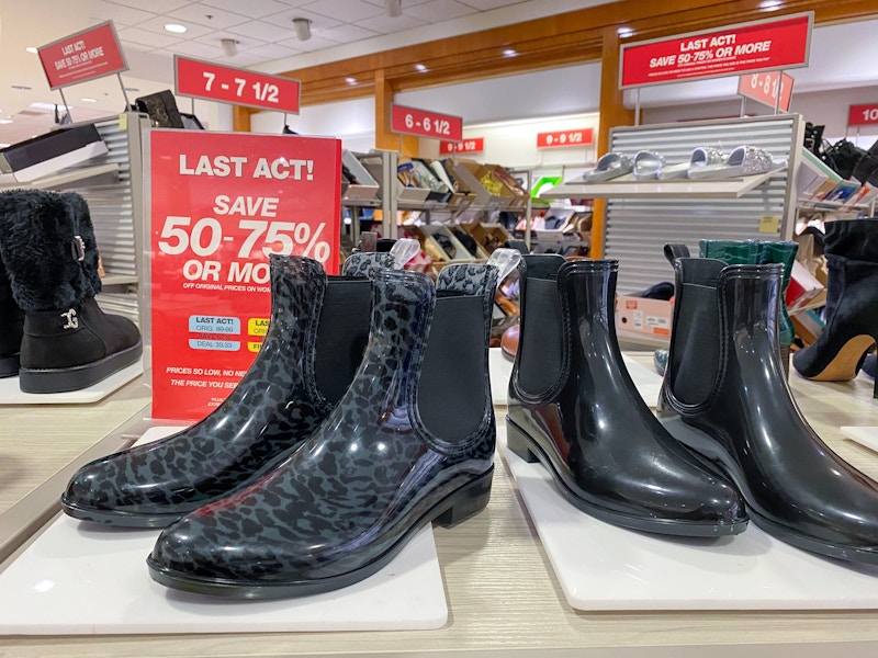 boots next to macys clearance sign