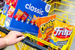 frito-lay, cheetos, fritos in yellow shopping cart