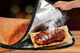 hand holding open the meat resting blanket