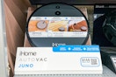 iHome Juno Robot Vacuum on shelf in Walmart store