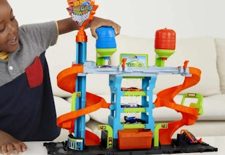 child playing with the Hot Wheel Car Wash playset