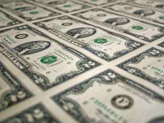 a sheet of two dollar bills