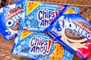 nabisco chips ahoy and oreo cookies piled together in a cart