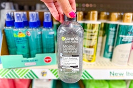 hand holding garnier micellar water at dollar tree