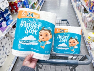 hand holding angel soft toilet paper and in walgreens cart