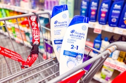 2 bottles of head and shoulders shampoo in a cart