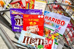 shopping cart with m&ms, smart sweets, haribo, godiva, and more candy