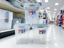 3 Hefty Storage bins in center aisle in Target store
