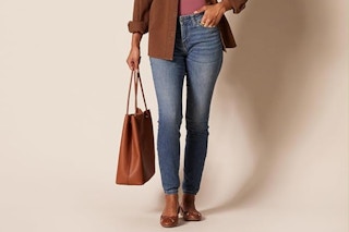 a woman wearing amazon essentials jeans