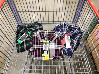 flannel shirts in a cart