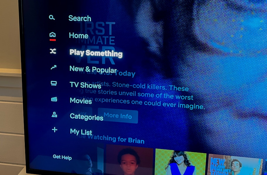 tv screen showing the netflix app open and the option to "play something" selected from the left menu