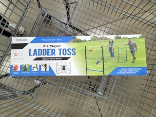 ladder toss game in a cart