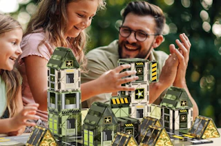 a family playing with magnetic tiles