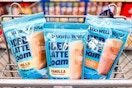 3 bags of maxwell house iced latte foam in a cart