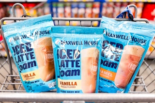 3 bags of maxwell house iced latte foam in a cart