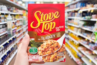 hand holding a box of stove top stuffing