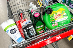 nivea shave gel, axe deodorant, colgate toothpaste, palmolive dish soap, and gain flings in a cart