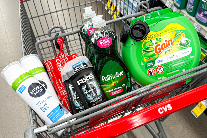 nivea shave gel, axe deodorant, colgate toothpaste, palmolive dish soap, and gain flings in a cart