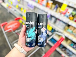 hand holding axe deodorant dry sprays