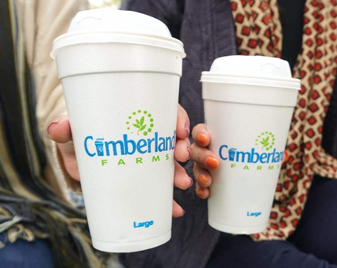 two people holding cumberland coffes