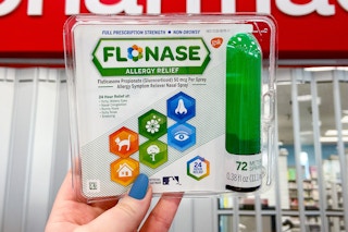 hand holding a package of flonase allergy relief sinus spray