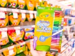 hand holding a pack of crayola 50-count markers at target