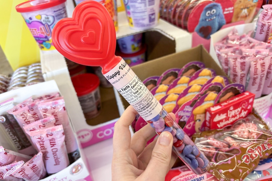 hand holding heart candies clearance