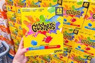 hand holding gushers fruit snacks variety pack